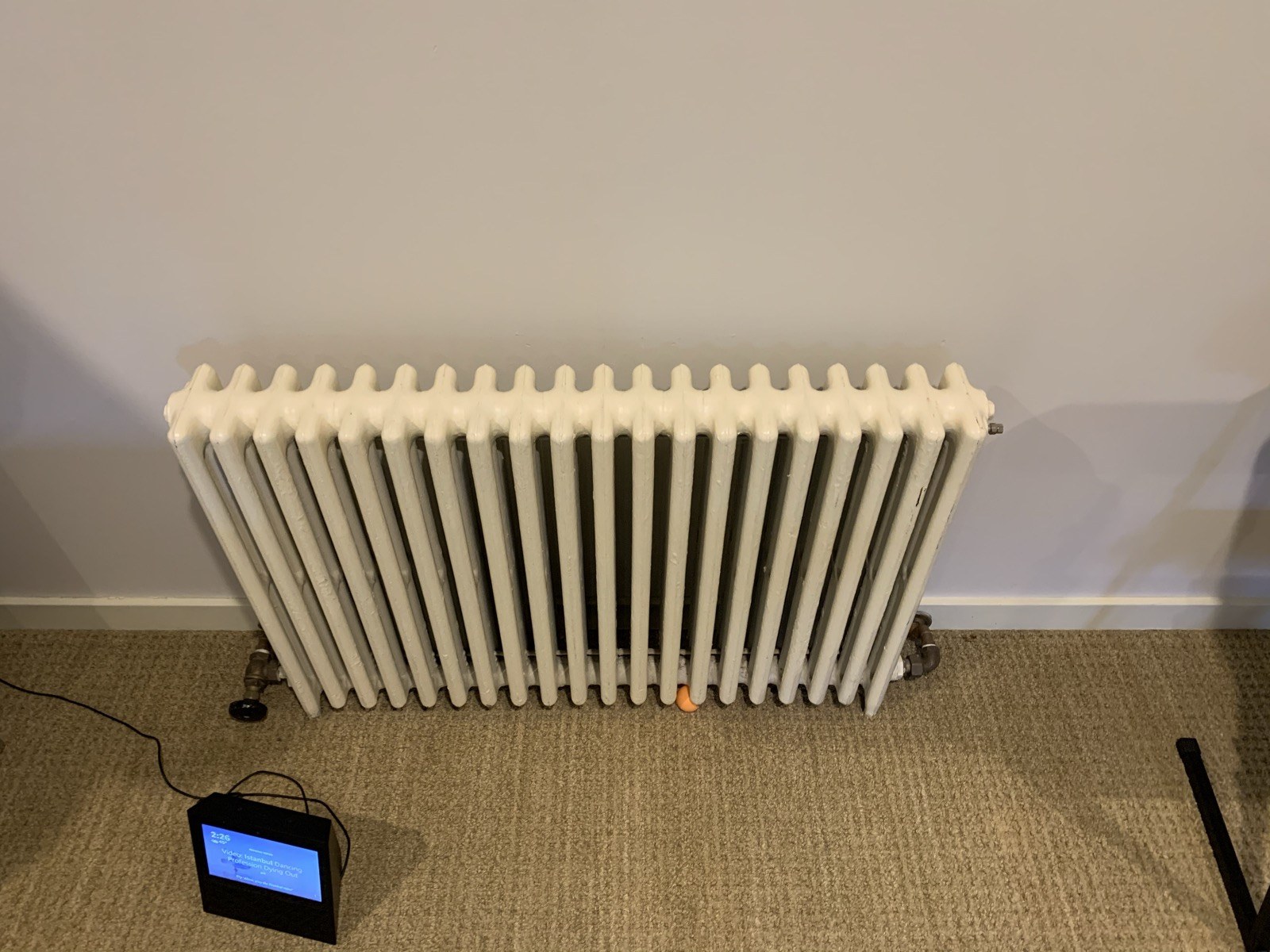 Sectional hydronic radiator with valves and pipe connections